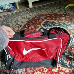 nike duffle small size